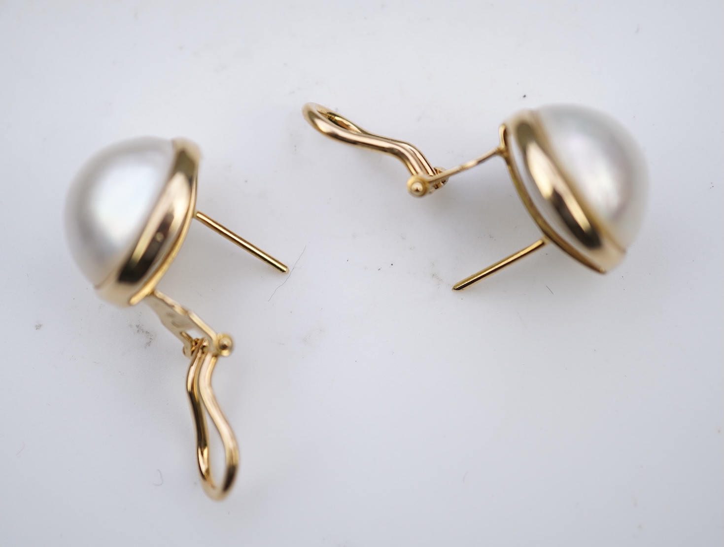 A pair of mabé cultured pearl earrings